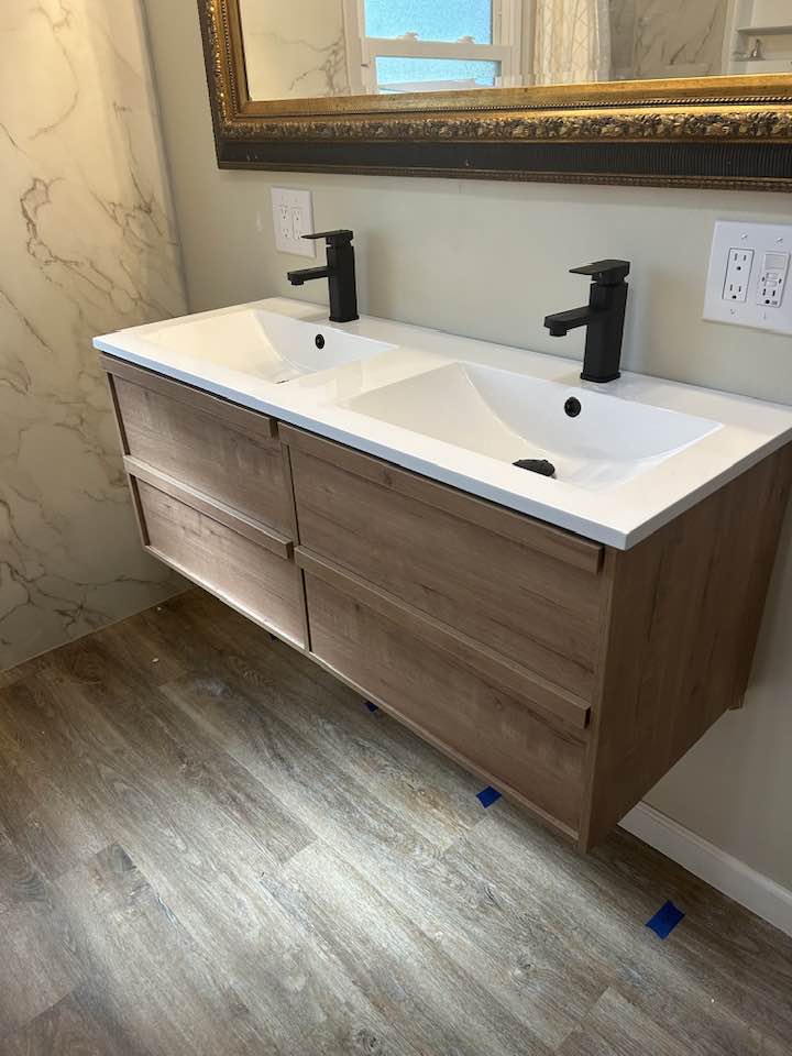 A modern bathroom remodel completed by Bowen Plumbing